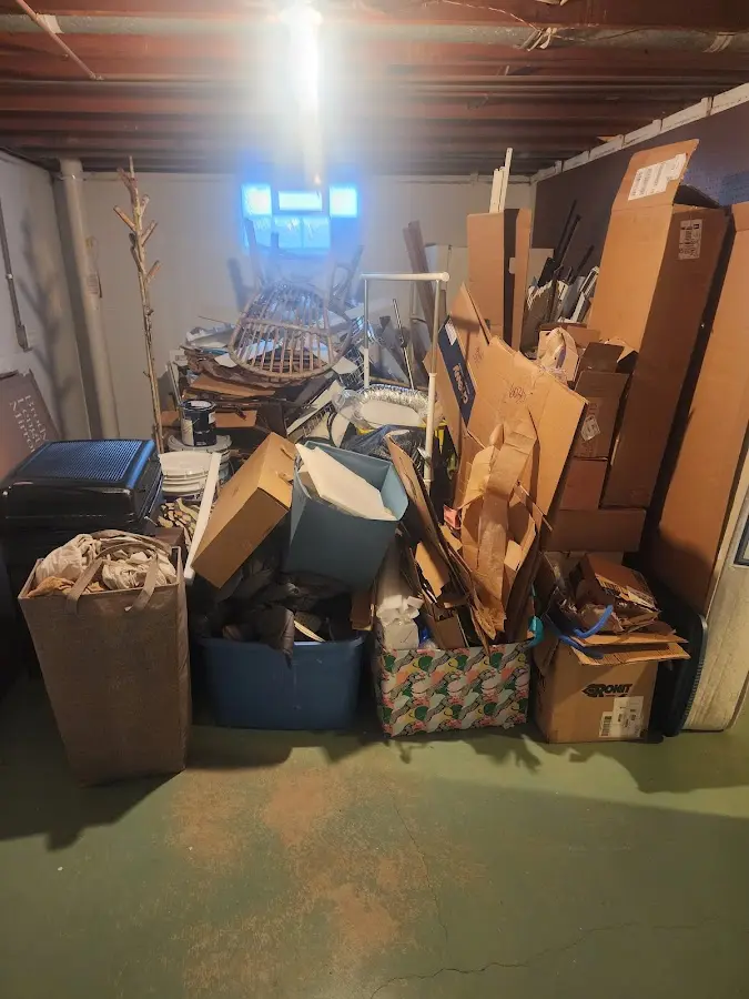 Roll-off dumpster container at job site for 2 Yard Dumpster Rental in Salida